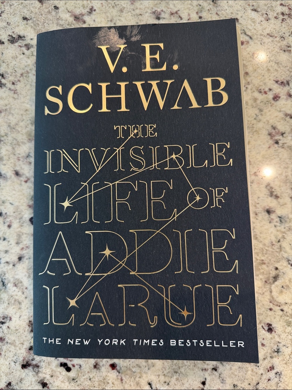 V.E. Schwab "The Invisible Life of Addie LaRue" - Black & Gold Paperback/Book